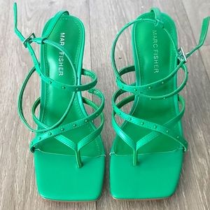 These are green heels in a size 7